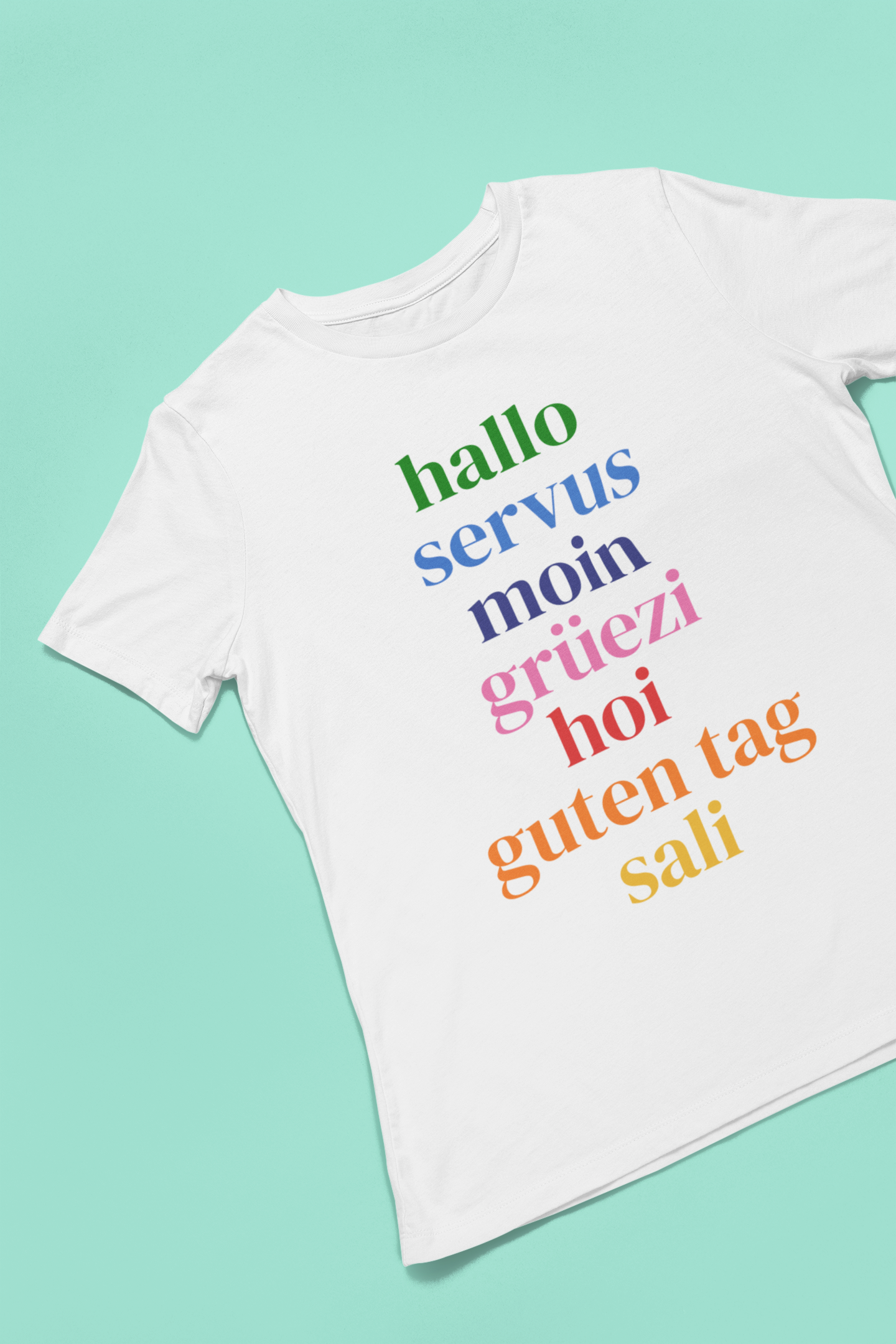 white travel tee with german greetings